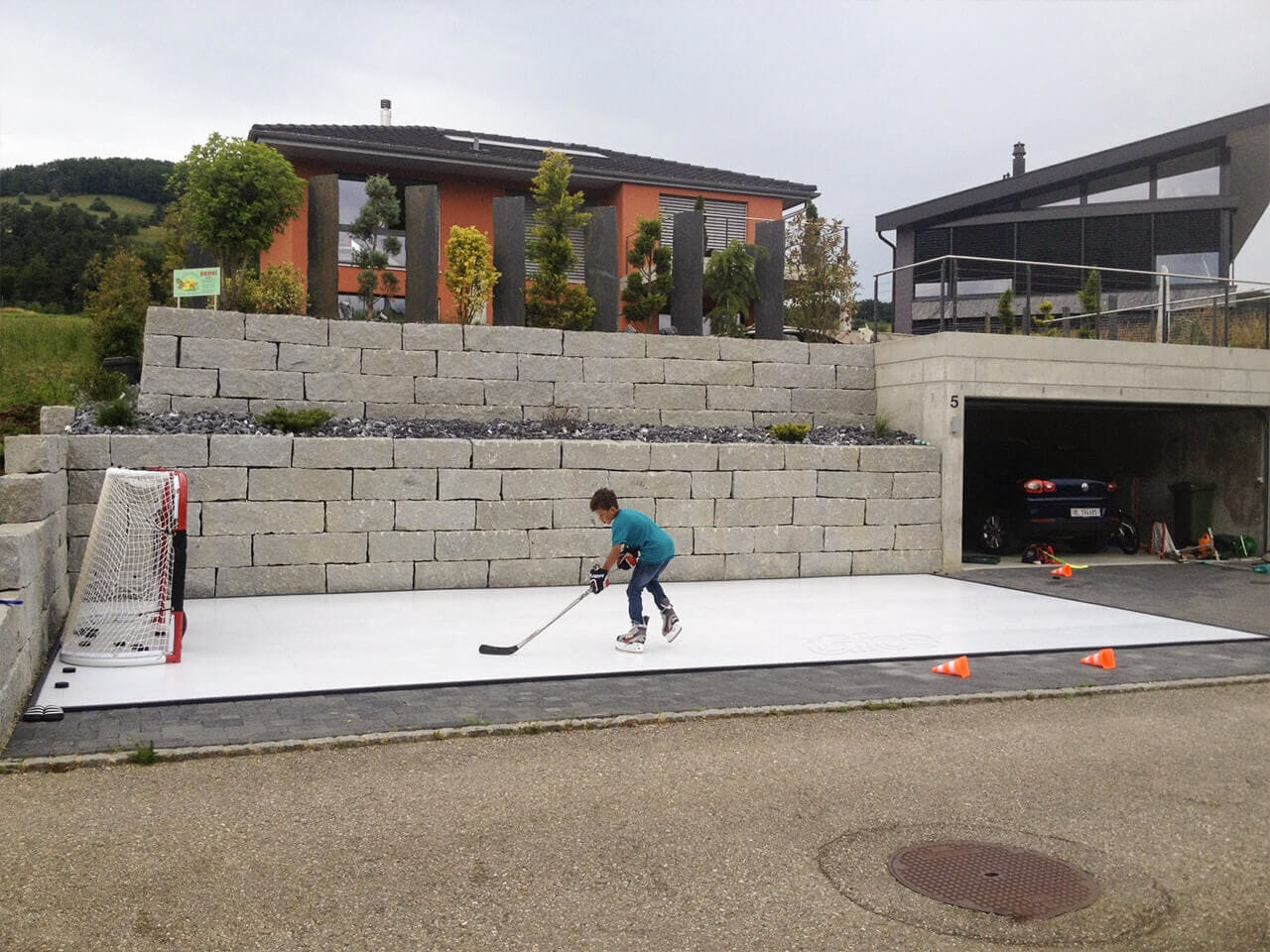 Swiss-kid-practicing-on-artificial-ice-pad