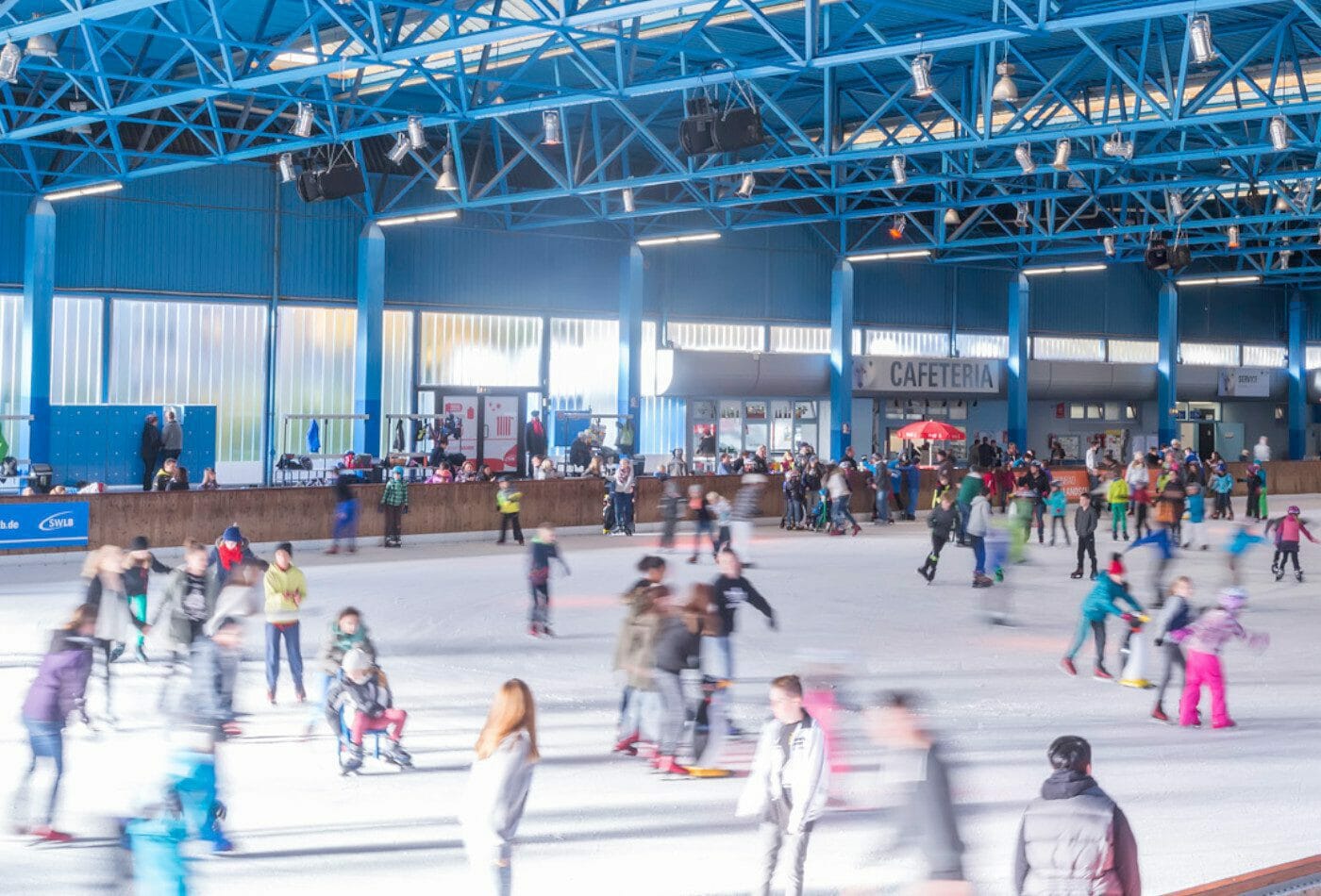 People skating on synthetic ice